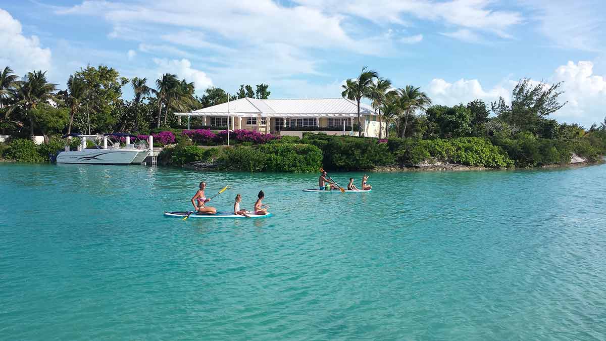 paddleboard in turquoise water of Turks and Caicos